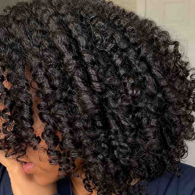 Defined 3B curl pattern after overnight twist out takedown on natural hair"