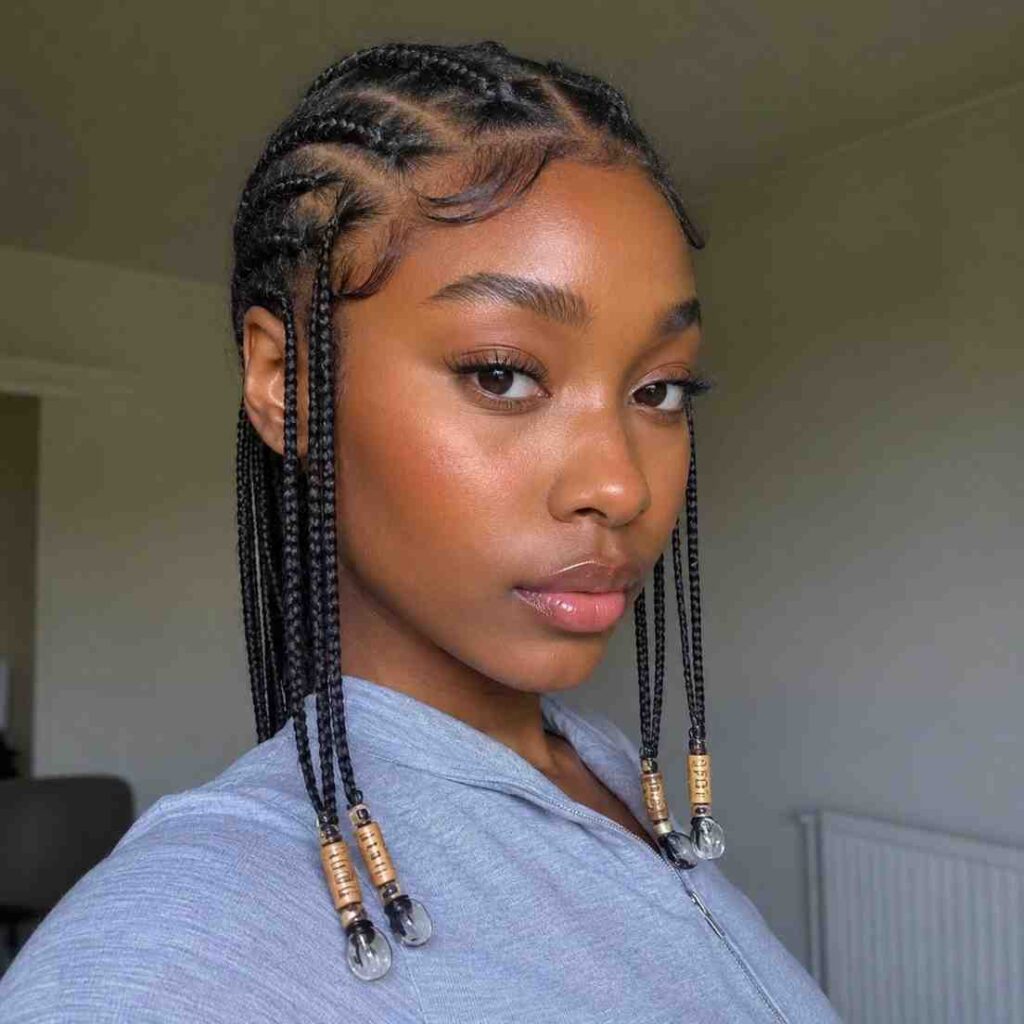 Fulani Braids for Round Face Shapes: The Styles That Flatter Most Fulani braids with accessories placed at braid ends rather than at ear level